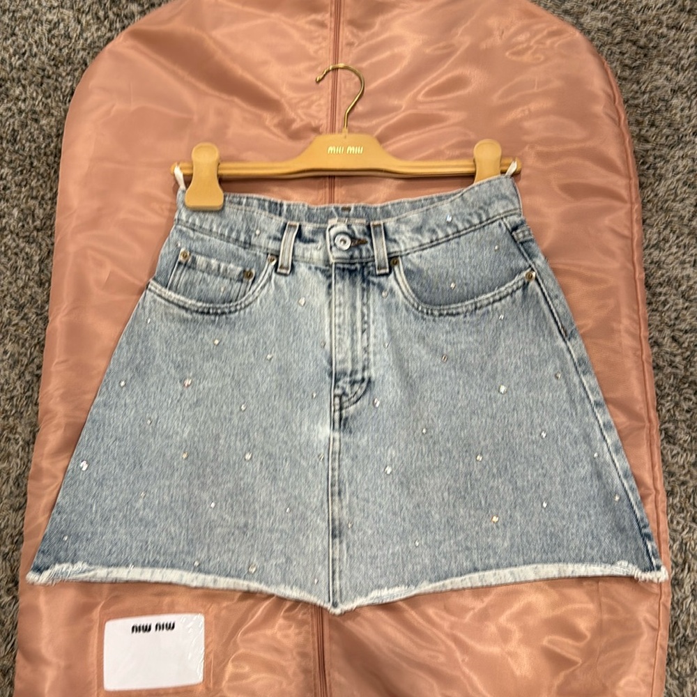 MIU MIU crystal-embellished denim skirt.